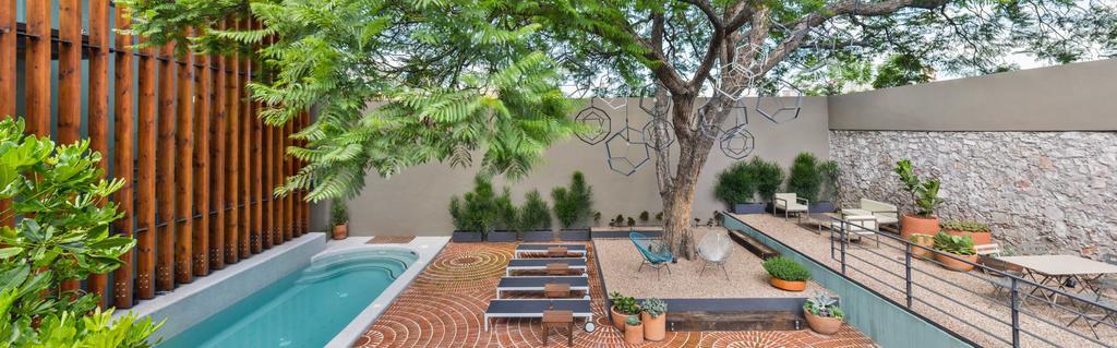 Hotel Criol ケレタロ エクステリア 写真 A 3D rendering of a backyard