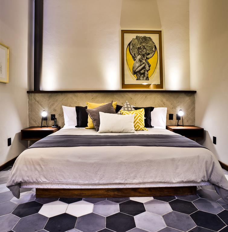 Hotel Criol ケレタロ エクステリア 写真 A bedroom at the hotel